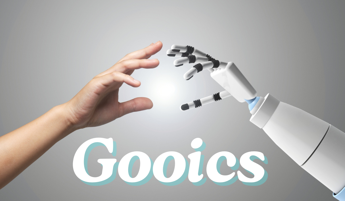 A human hand reaching toward a robotic hand against a gray background, symbolizing the connection between humans and artificial intelligence. The word “Gooics” appears at the bottom in large stylized white text with a light blue shadow effect.