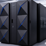 **Alt Text:** Modern mainframe computer system in a high-tech data center **Caption:** Mainframe computer technology powering enterprise data processing **Description:** A modern mainframe computer system installed in a secure data center, representing powerful enterprise computing, large-scale data processing, and advanced technology infrastructure.